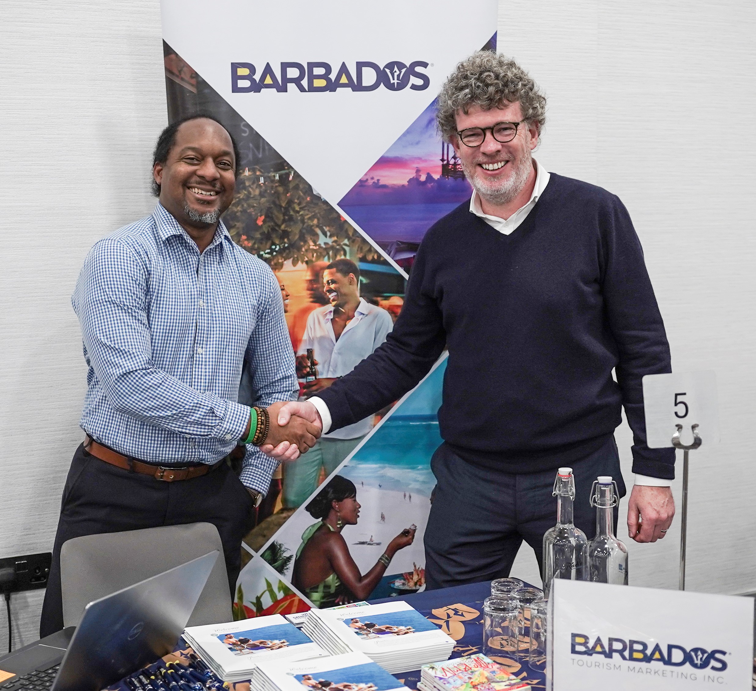 Michael Collins of TravelMedia.ie shaking hands with Mark McCollin of Visit Barbados